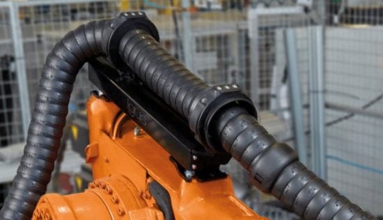 New retraction system for energy chains ensures fail-safe operation of robots in modern factories. Article by igus.